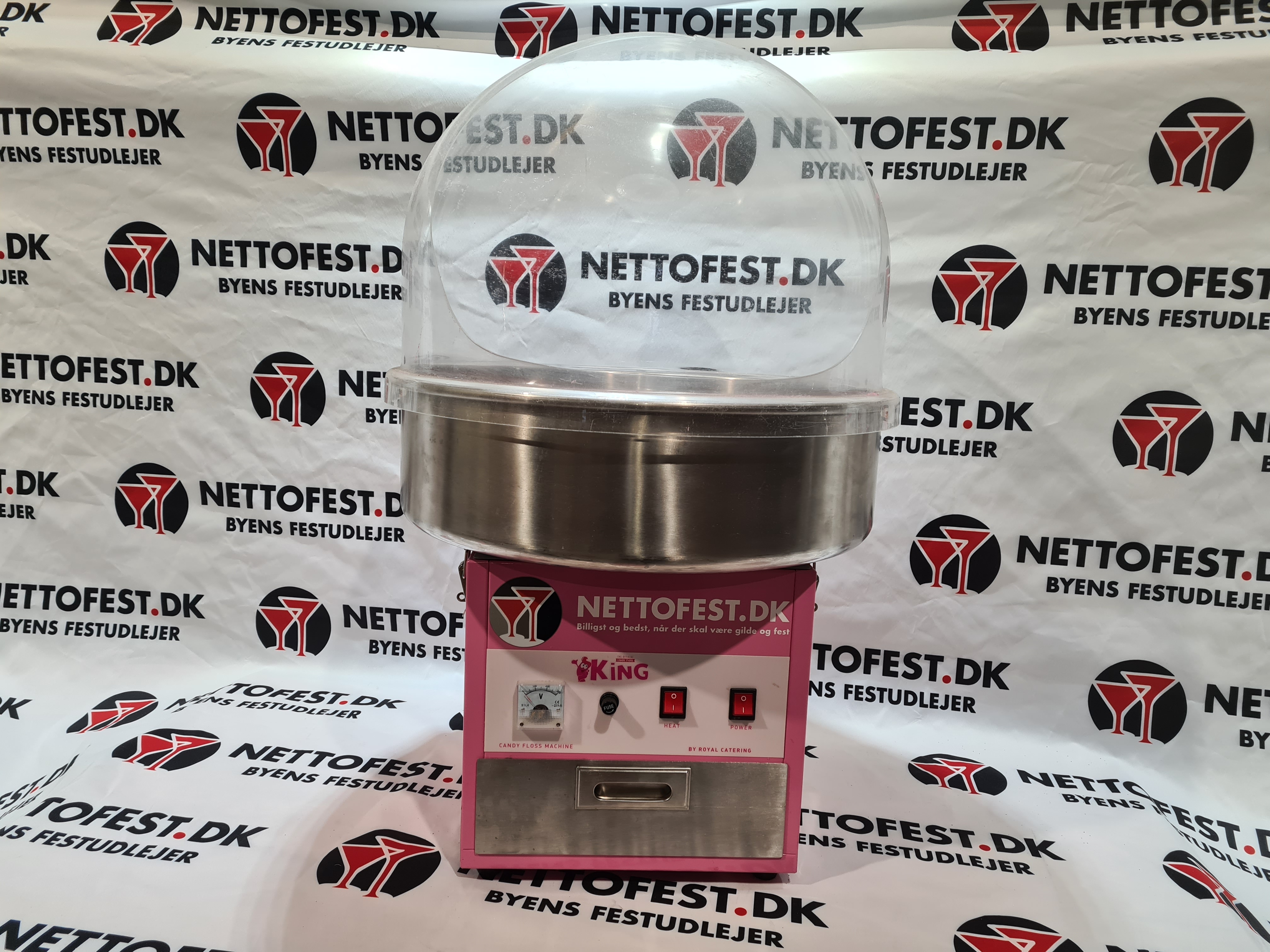 Eight shirts arranged on table in black, olive, grey, blue, white, red, mustard, and green.