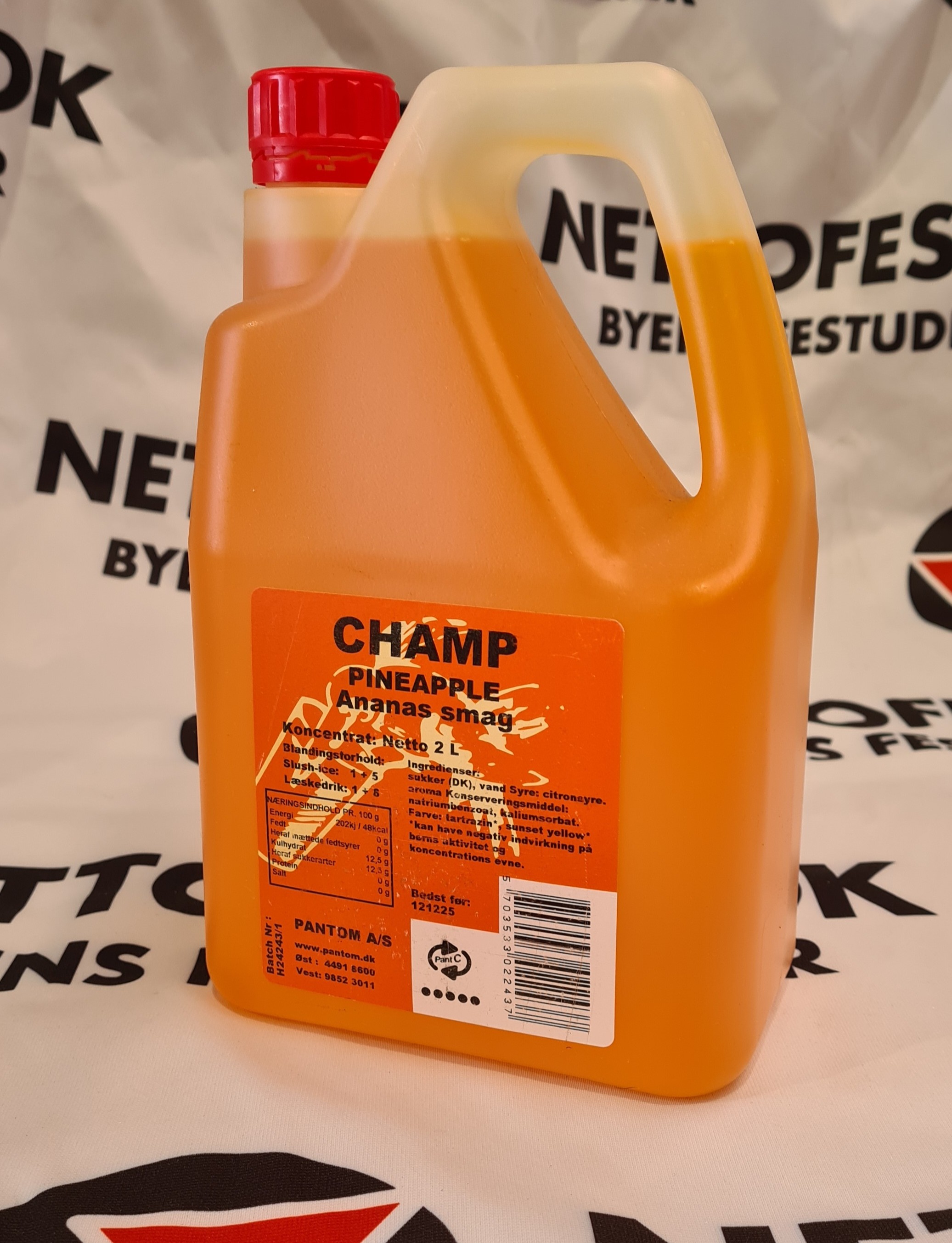 Eight shirts arranged on table in black, olive, grey, blue, white, red, mustard, and green.