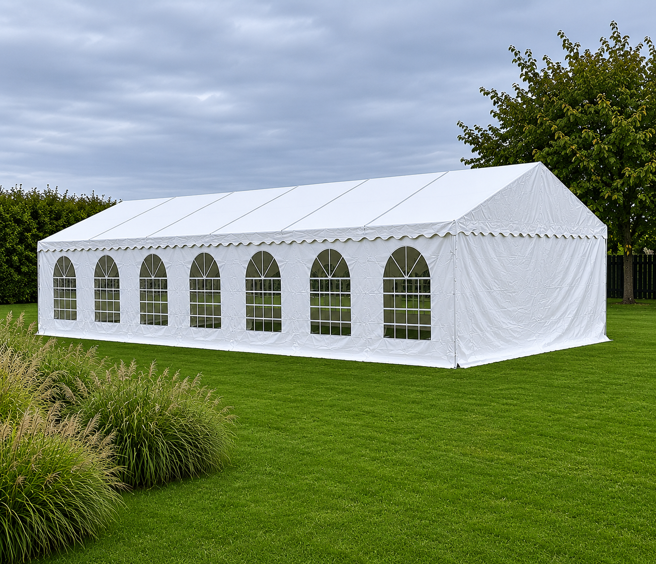 Eight shirts arranged on table in black, olive, grey, blue, white, red, mustard, and green.