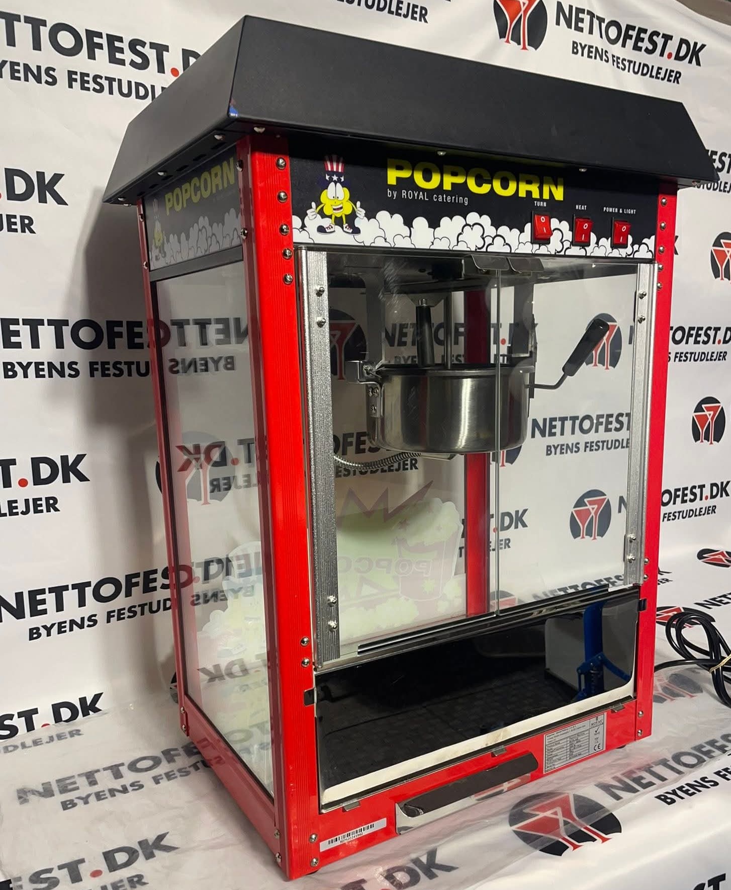 Eight shirts arranged on table in black, olive, grey, blue, white, red, mustard, and green.