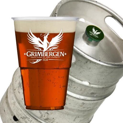 Eight shirts arranged on table in black, olive, grey, blue, white, red, mustard, and green.